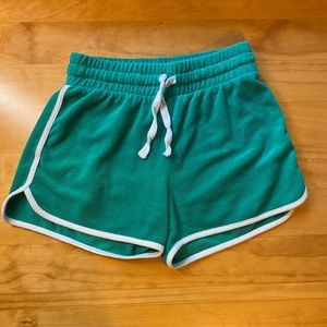 emerald green casual shorts with white trim